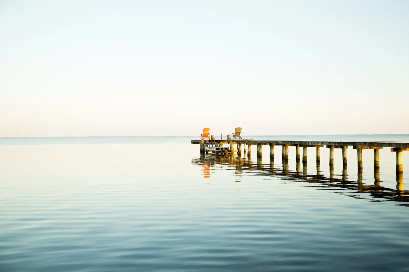 Image of a serene landscape overlooking a bay.