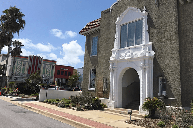 Image of the Panama City Center for the Arts with the historic Martin Theatre in the background.